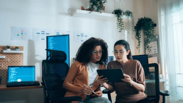 teammates researching procurement software