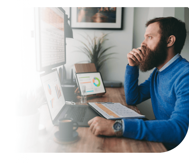 man using spend management software to control procurement spend