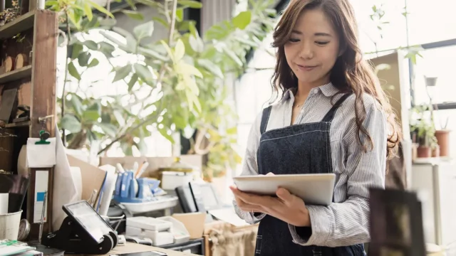 manager checking her list of vendors