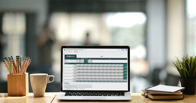 financial projections template on laptop