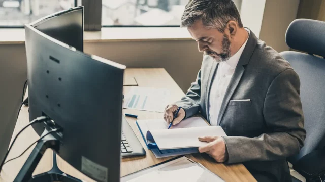 AP manager revieiwng ledger