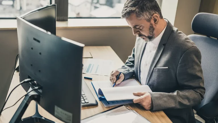 AP manager revieiwng ledger