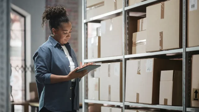 manager reviewing inventory and vendors