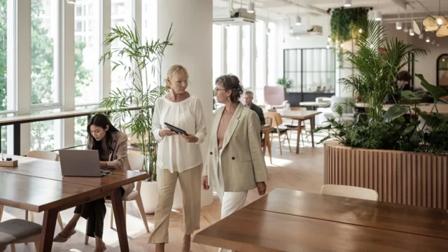 ladies discussing office supply procurement