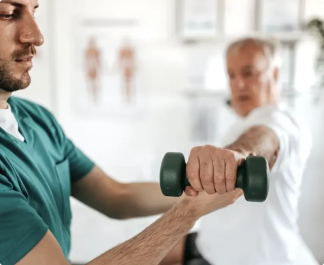 physical therapist and patient