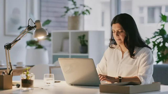 woman reviewing report findings