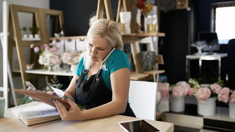 retail store manager handling store cash flow