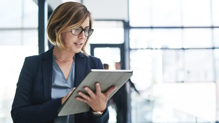 manager reviewing vendor locked virtual card spending at her business