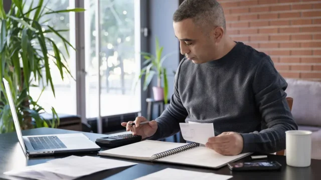 finance manager completing a profitability analysis of their business