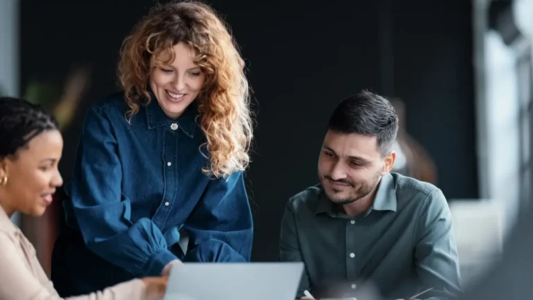teammates looking at procurement transformations