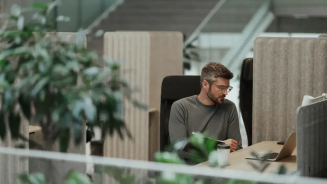 manager reviewing cash back business credit card options