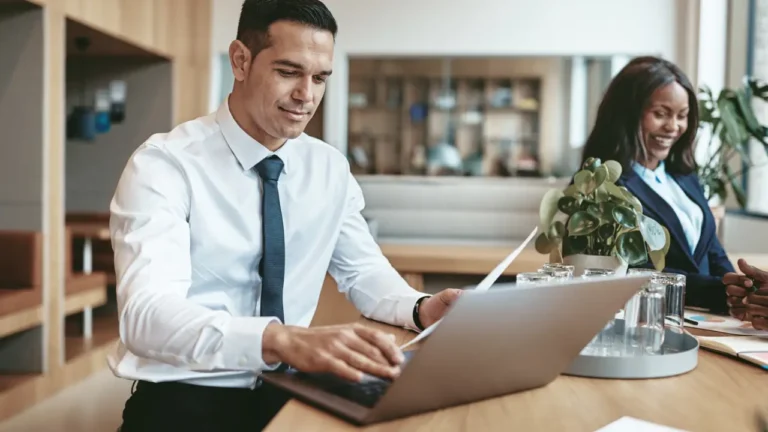 manager reviewing fair credit business credit card options