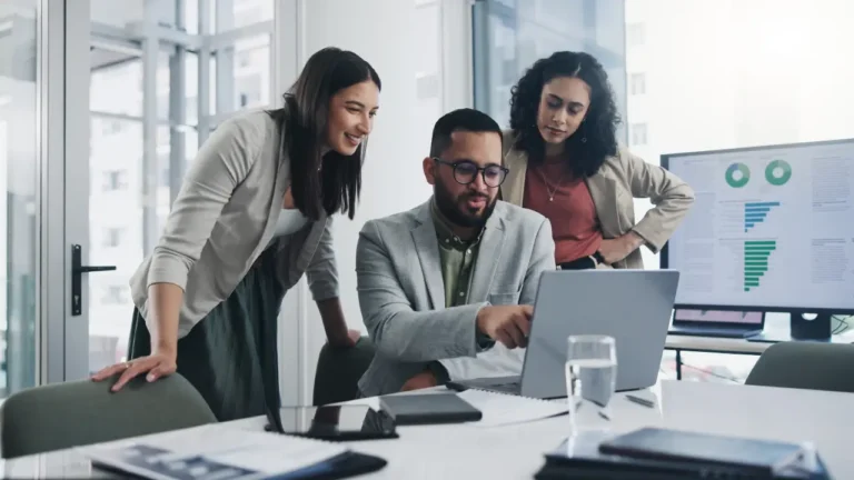 nonprofit team reviewing procurement software options