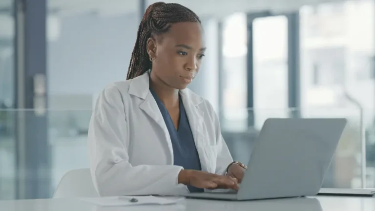 manager reviewing best procurement software for biotech startups