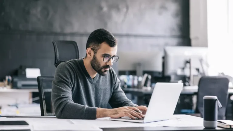 professional looking at product catalog to simplify procurement