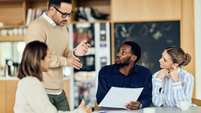 educators reviewing a procurement guide to simplify processes