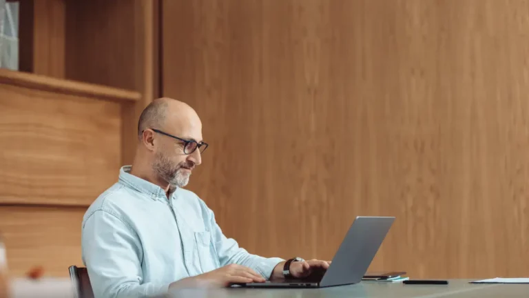 procurement manager reading about risks of cheap software