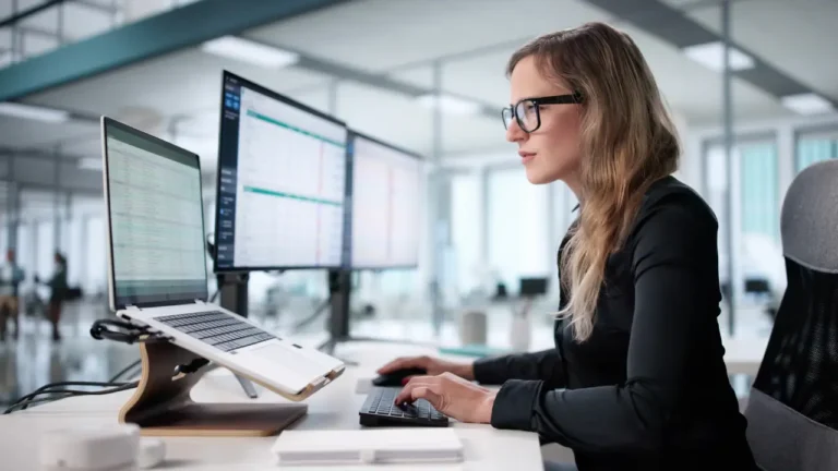 professional looking at how to reduce manual invoice processing