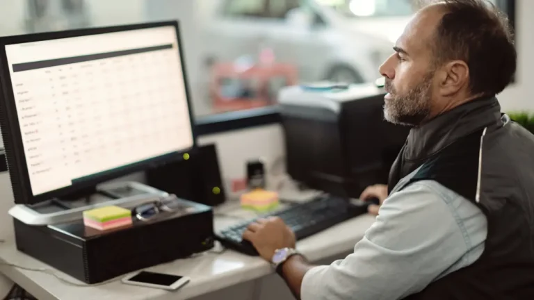 car wash manager researching procurement software