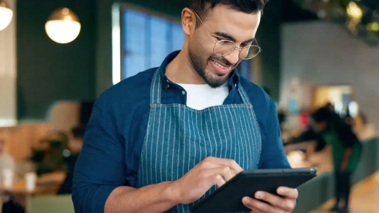 franchise manager reviewing procurement software options
